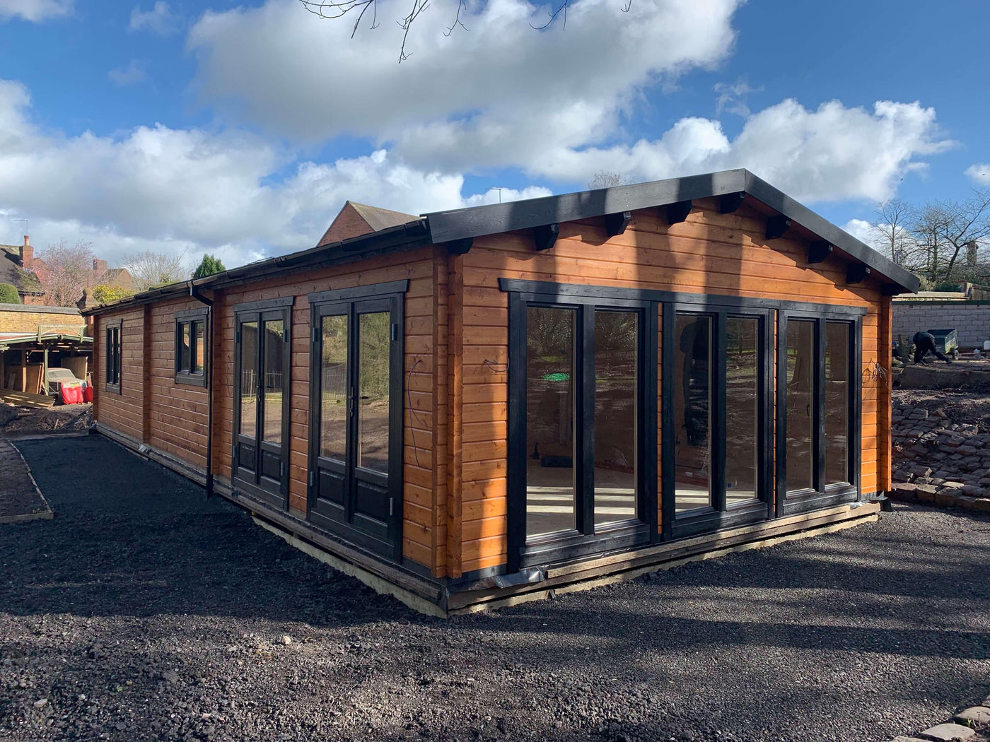 TBS129 Log Cabin wSide Storage | 7.0x4.25m