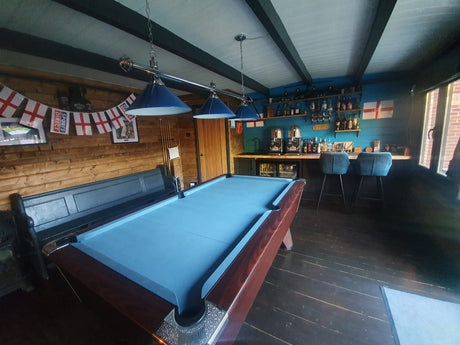 games room log cabin with snooker table and bar