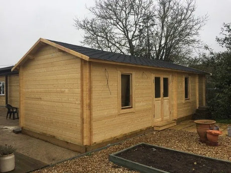 The Surrey Log Cabin: A Twin Skin Masterpiece - Timber Building Specialists