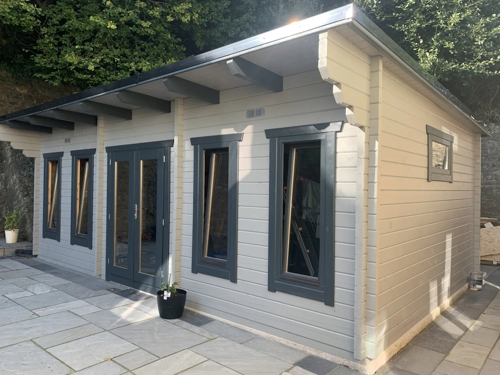 bespoke garen log cabin office, in dove grey paint