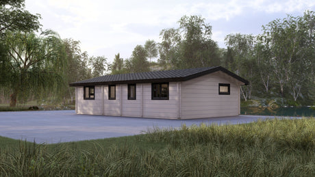 Modern bespoke log cabin on concrete base surrounded by trees, custom timber building design