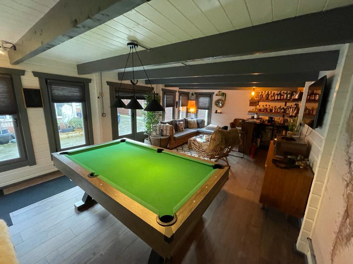 log cabin games room with snooker table pool table