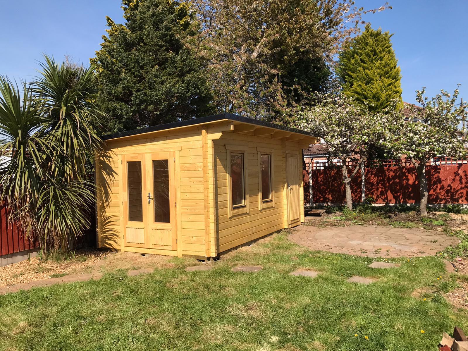 TBS141 Log Cabin | 5.0x3.0m In Garden