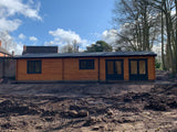 TBS136 Log Cabin | 14.0x6.0m Front Exterior
