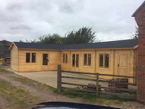 TBS139 L-Shaped Log Cabin | 13.0x7.0m - Timber Building Specialists