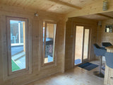 TBS146 L Shaped Log Cabin | 7.0x6.0m Interior Windows